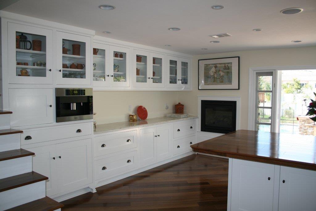 White kitchen with shaker cabinet style is perfect for holiday gatherings with family