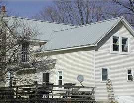 CLIPLESS STANDING SEAM METAL ROOF Photo 2