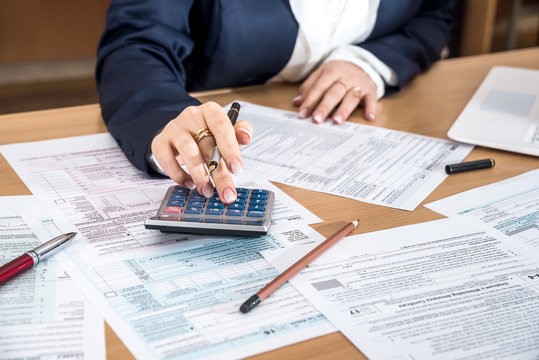 Person Trying to Figure Out 2026 Solar Tax Credit