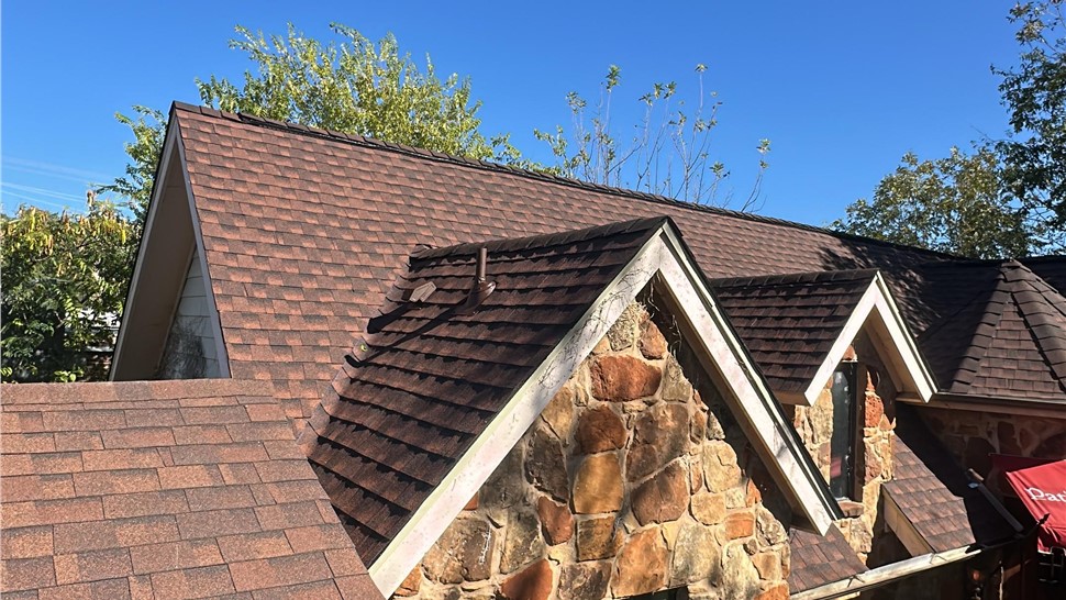 Completed commercial roof replacement in Austin TX with GAF Timberline HDZ Hickory shingles
