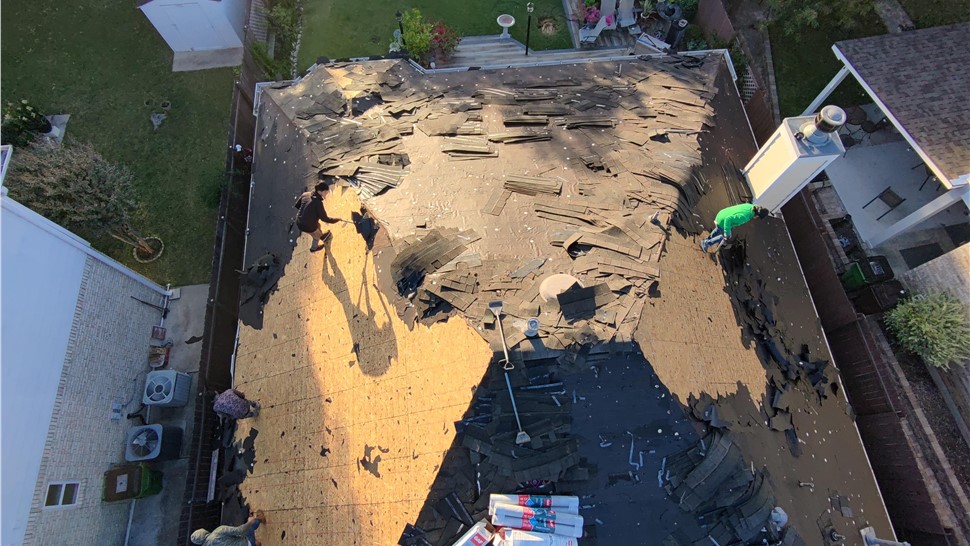 Aerial view of roof tear off during Round Rock TX roof replacement