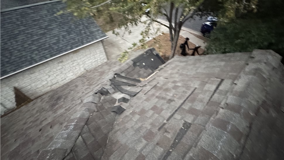 Old damaged roof shingles before roof replacement in Austin TX