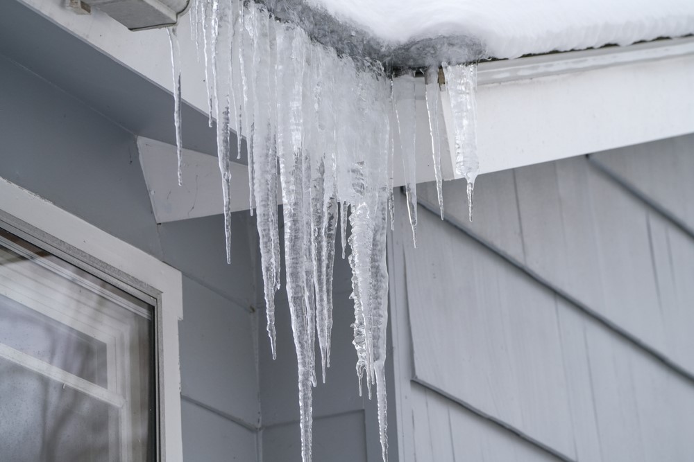 Ice Dams in Grand Rapids: How They Form, How to Prevent Them, and When to Call a Roofer