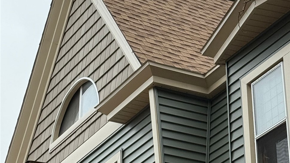 New vinyl siding installed during Grand Rapids exterior renovation.