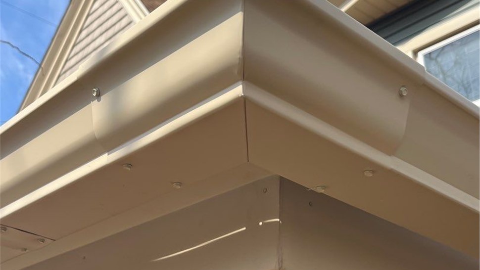New gutter installation in Grand Rapids exterior improvement project.