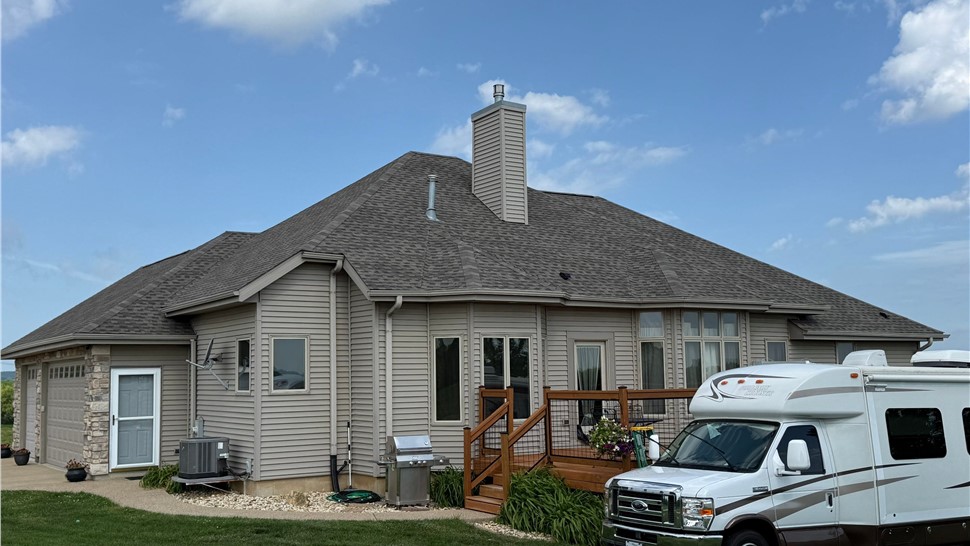 Finished residential roofing system with GAF Timberline HDZ asphalt shingles.
