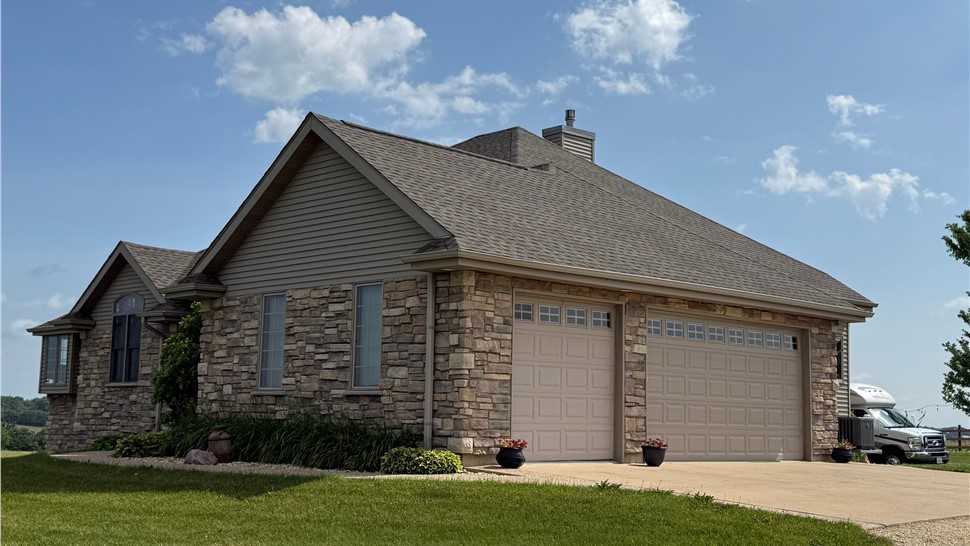 New GAF Timberline HDZ Weathered Wood shingles installed on a Freeport home.