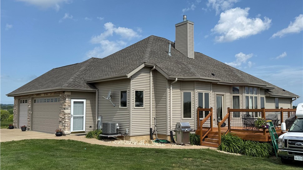 Residential roof replacement completed by Boss Roofing-Siding Experts in Freeport, Illinois.