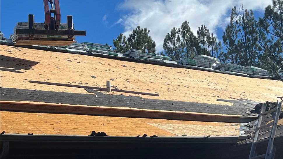 Roof removal and deck preparation for new Malarkey shingles in Custer, SD.