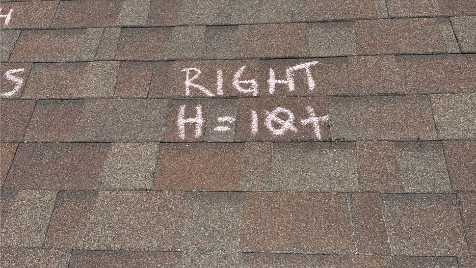 Completed roof replacement in Custer, SD featuring Malarkey Highlander Heather Blend shingles and brown trim.