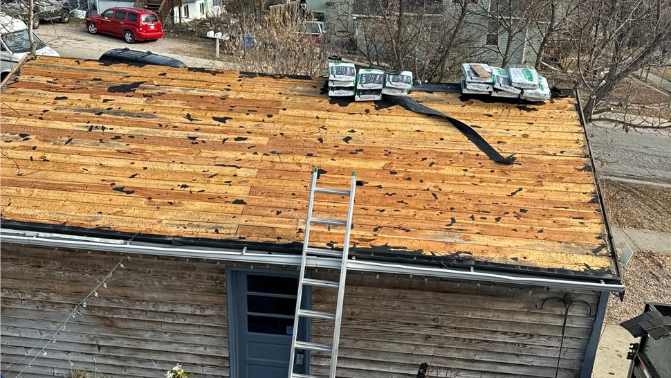 Rapid City SD roof before replacement showing bare decking and prep work