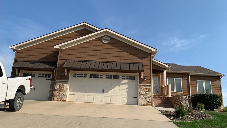 Roofing preparation and framing work before siding and shingle installation in Rapid City, SD.