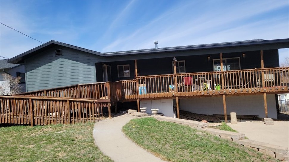 Spearfish SD home after James Hardie Iron Grey siding installation with black trim
