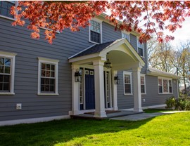 Gutters, Portico, Siding, Windows Project in Stamford, CT by Burr Roofing, Siding & Windows