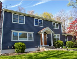 Gutters, Portico, Siding, Windows Project in Stamford, CT by Burr Roofing, Siding & Windows