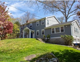 Gutters, Portico, Siding, Windows Project in Stamford, CT by Burr Roofing, Siding & Windows