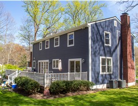 Gutters, Portico, Siding, Windows Project in Stamford, CT by Burr Roofing, Siding & Windows