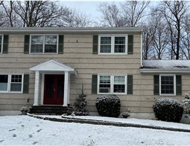 Gutters, Portico, Siding, Windows Project in Stamford, CT by Burr Roofing, Siding & Windows