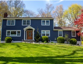 Gutters, Portico, Siding, Windows Project in Stamford, CT by Burr Roofing, Siding & Windows