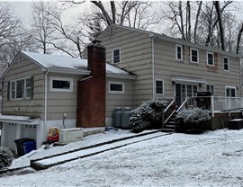 Gutters, Portico, Siding, Windows Project in Stamford, CT by Burr Roofing, Siding & Windows