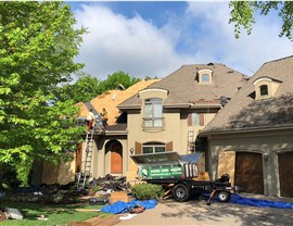 Gutters, Roof Replacement, Storm Restoration Project in Lakeville, MN by Capital Construction LLC