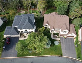 two home next door to each other with new roofs from owens corning