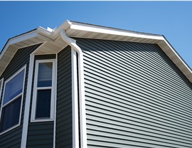 photo of siding on upper portion of the home
