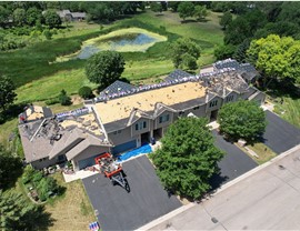 Gutters, Multi-Family Roofing, Roof Replacement Project in Northfield, MN by Capital Construction LLC