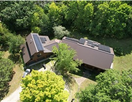 drone image of metal roof on midcentury modern home