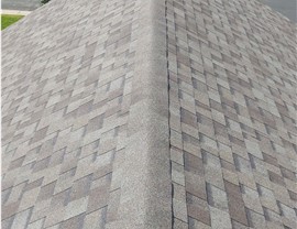 owens corning driftwood shingles installed on a home