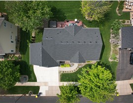 drone image of home directly over home creating dark gray rectangle