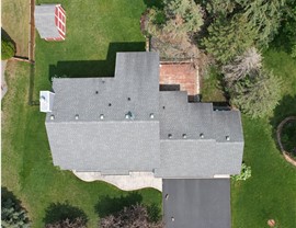 drone image directly above gray roof