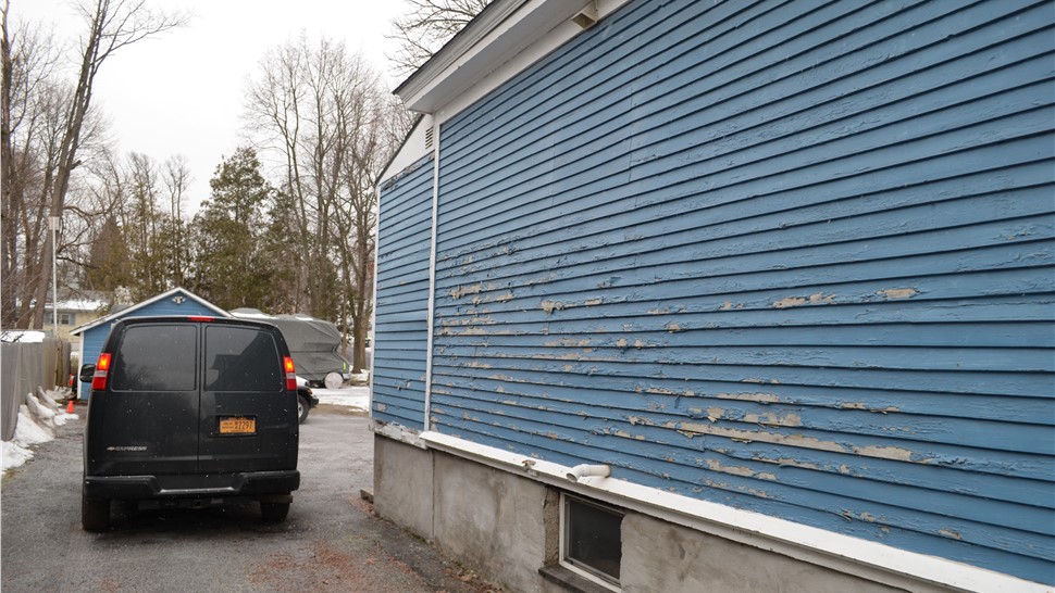 Siding Project in North Syracuse, NY by C. Michael Exteriors, Inc.