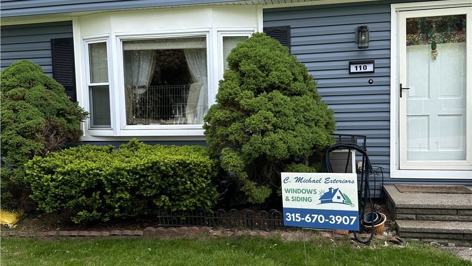 Siding Project in Liverpool, New York by C. Michael Exteriors, Inc.