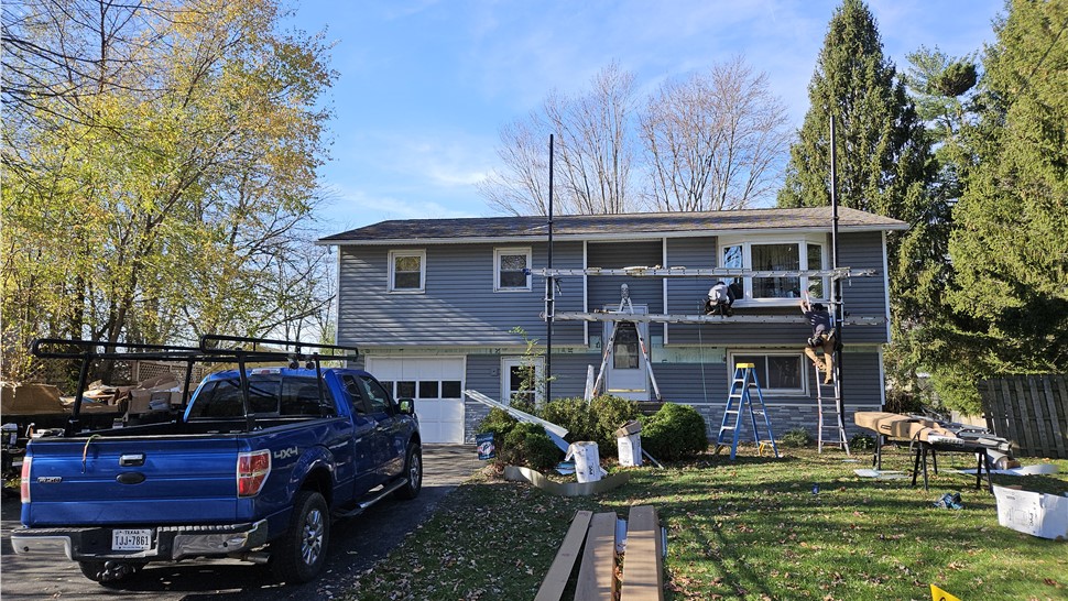 Siding Project in Liverpool, NY by C. Michael Exteriors, Inc.