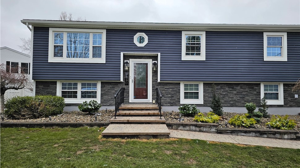 Siding Project in New Hartford, NY by C. Michael Exteriors, Inc.