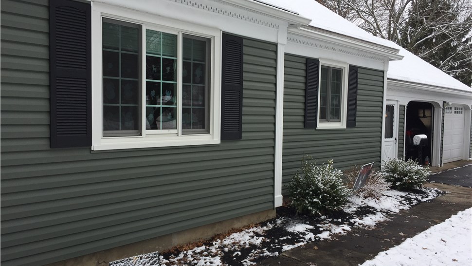 Siding Project in Newark, NY by C. Michael Exteriors, Inc.