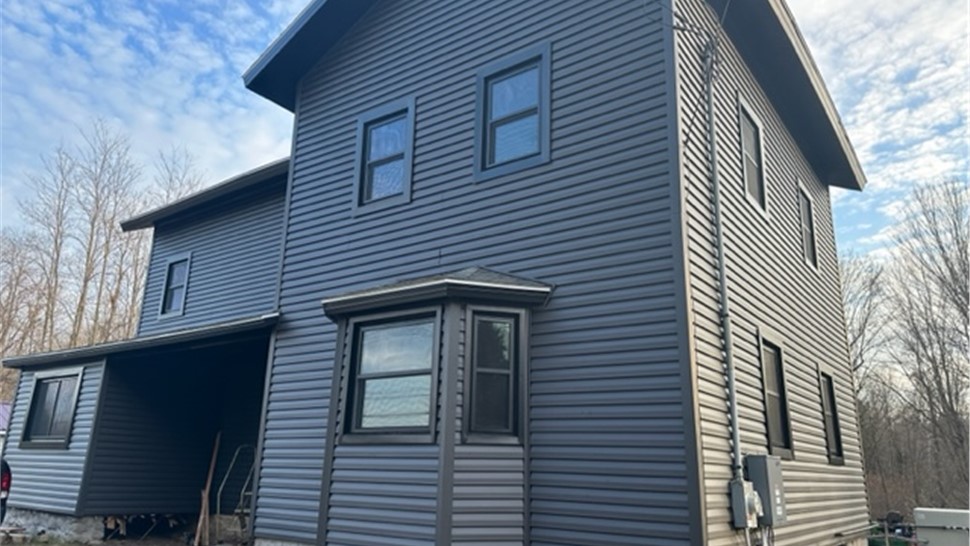 Siding Project in Phoenix, NY by C. Michael Exteriors, Inc.