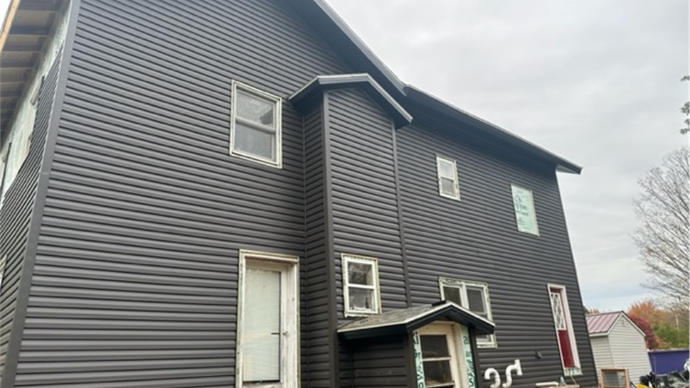 Siding Project in Phoenix, NY by C. Michael Exteriors, Inc.