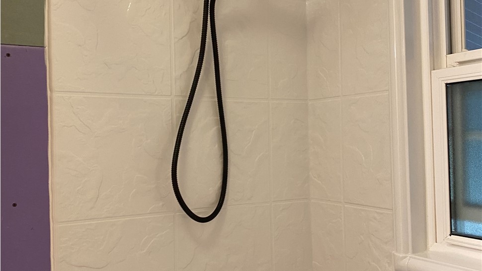 Bathrooms Project in Utica, NY by C. Michael Exteriors, Inc.