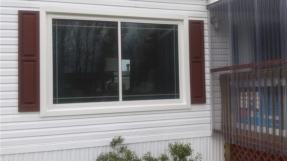 Windows Project in Sandy Creek, NY by C. Michael Exteriors, Inc.