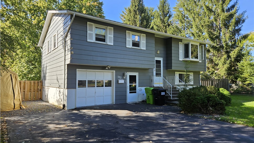 Siding Project in Liverpool, NY by C. Michael Exteriors, Inc.