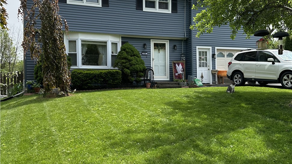 Siding Project in Liverpool, New York by C. Michael Exteriors, Inc.