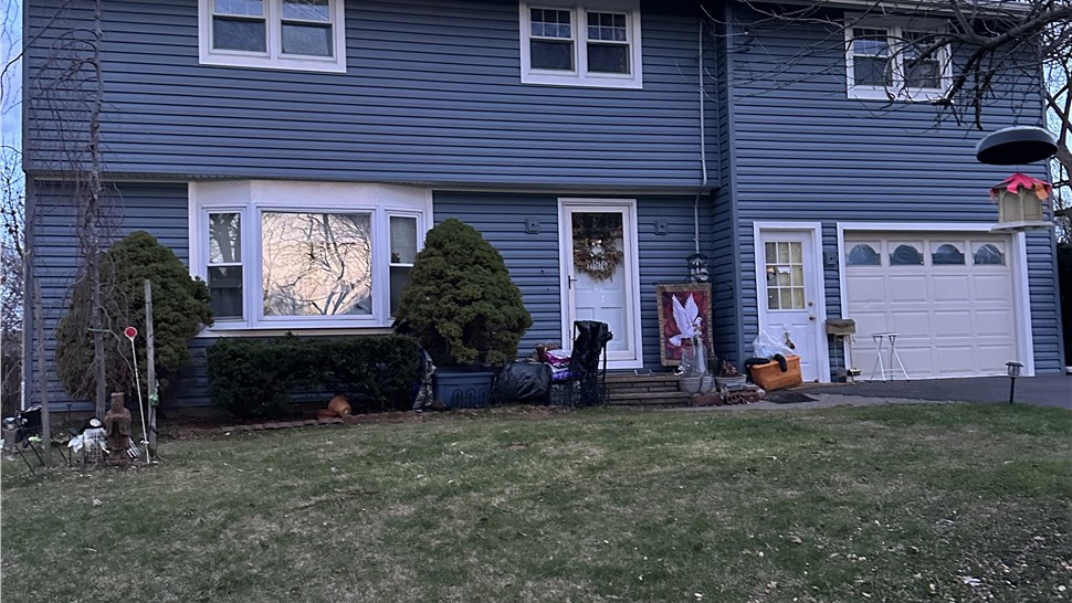 Siding Project in Liverpool, New York by C. Michael Exteriors, Inc.