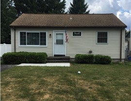 Siding Project Project in Liverpool, NY by C. Michael Exteriors