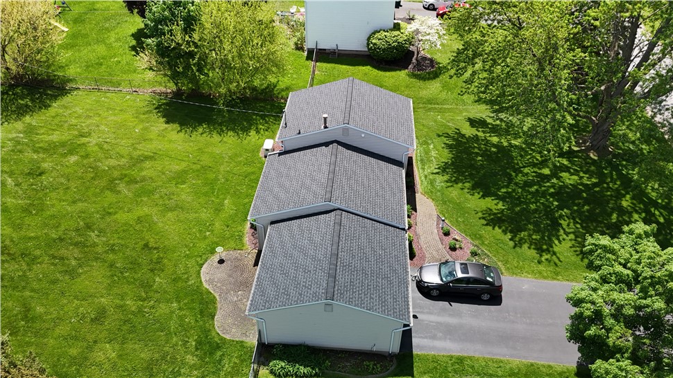 Roofing Project in Rochester, New York by Comfort Windows & Doors