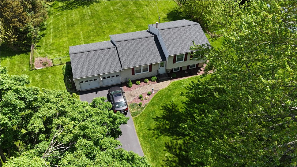 Roofing Project in Rochester, New York by Comfort Windows & Doors