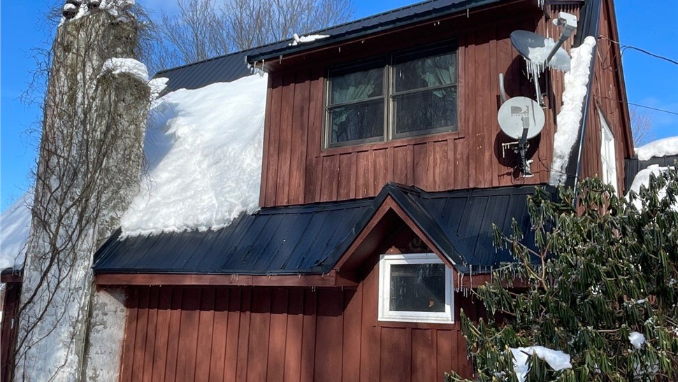 Storm Damage Project in Mayville, New York by Complete Roofing Systems