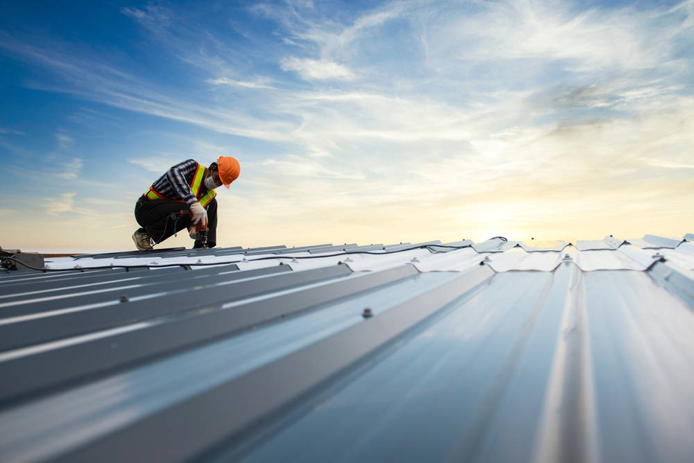 Photo of a Builder Working on Roof