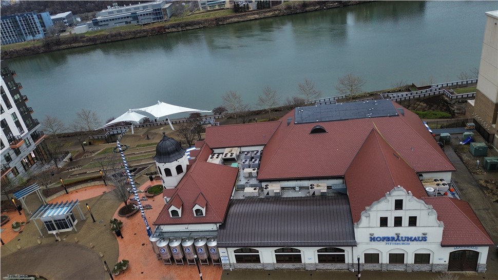 commercial roofing installation Hofbrauhaus Pittsburgh PA Evans Roofing and Gutters riverfront building